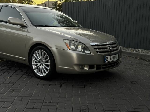 Бежевый Тойота Авалон, объемом двигателя 3.5 л и пробегом 180 тыс. км за 8000 $, фото 1 на Automoto.ua