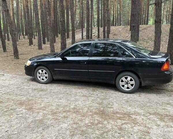 Черный Тойота Авалон, объемом двигателя 3 л и пробегом 140 тыс. км за 5000 $, фото 1 на Automoto.ua