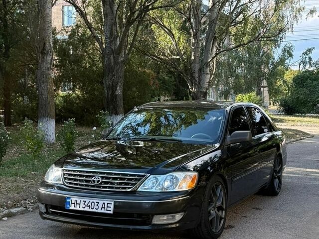 Черный Тойота Авалон, объемом двигателя 3 л и пробегом 300 тыс. км за 5000 $, фото 1 на Automoto.ua