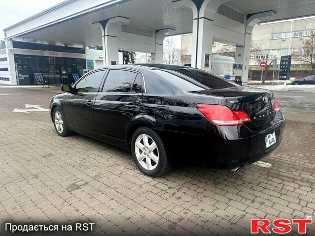 Черный Тойота Авалон, объемом двигателя 3.5 л и пробегом 330 тыс. км за 8000 $, фото 1 на Automoto.ua