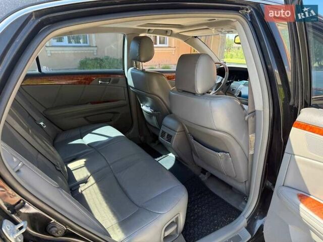 Черный Тойота Авалон, объемом двигателя 3.5 л и пробегом 256 тыс. км за 7500 $, фото 1 на Automoto.ua
