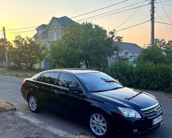 Черный Тойота Авалон, объемом двигателя 3.5 л и пробегом 227 тыс. км за 8300 $, фото 1 на Automoto.ua