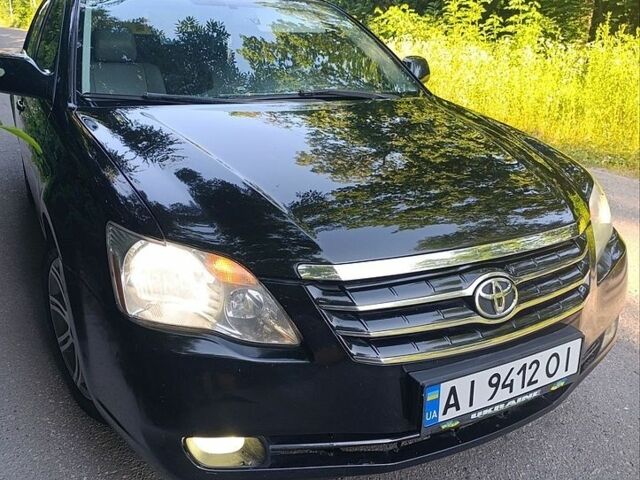 Черный Тойота Авалон, объемом двигателя 3.5 л и пробегом 256 тыс. км за 7000 $, фото 1 на Automoto.ua