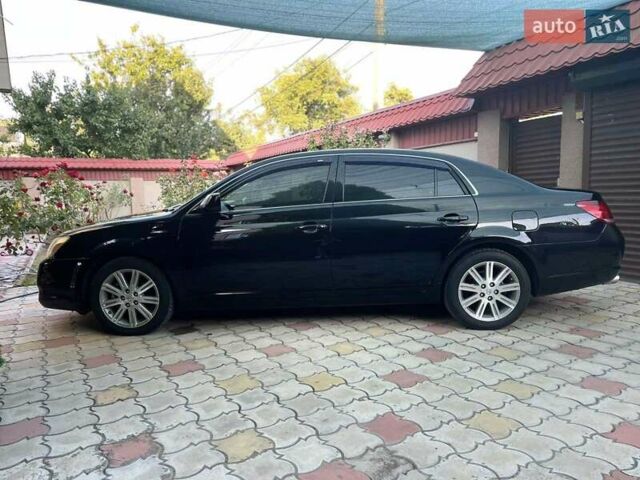 Черный Тойота Авалон, объемом двигателя 3.5 л и пробегом 300 тыс. км за 7500 $, фото 1 на Automoto.ua