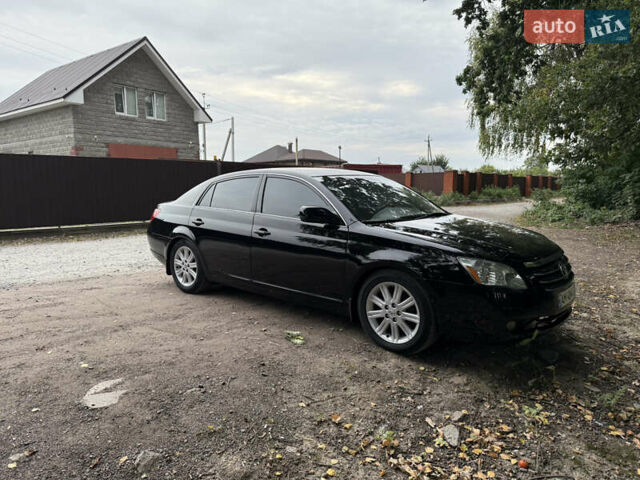 Черный Тойота Авалон, объемом двигателя 3.46 л и пробегом 433 тыс. км за 7900 $, фото 1 на Automoto.ua