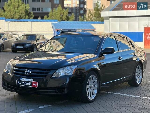Черный Тойота Авалон, объемом двигателя 3.5 л и пробегом 180 тыс. км за 8440 $, фото 1 на Automoto.ua