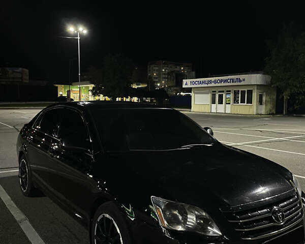 Черный Тойота Авалон, объемом двигателя 3.5 л и пробегом 255 тыс. км за 8500 $, фото 1 на Automoto.ua