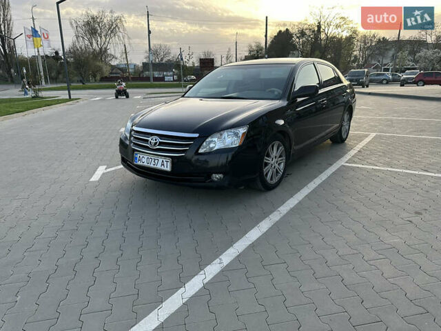 Черный Тойота Авалон, объемом двигателя 3.46 л и пробегом 142 тыс. км за 9500 $, фото 1 на Automoto.ua