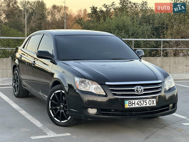 Черный Тойота Авалон, объемом двигателя 3.5 л и пробегом 256 тыс. км за 6000 $, фото 1 на Automoto.ua
