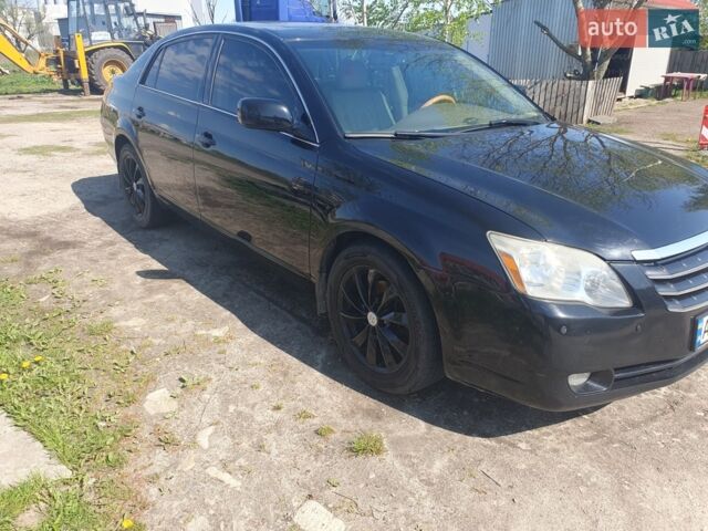 Черный Тойота Авалон, объемом двигателя 3.5 л и пробегом 270 тыс. км за 9000 $, фото 1 на Automoto.ua