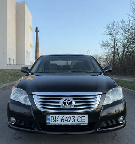 Черный Тойота Авалон, объемом двигателя 3.5 л и пробегом 280 тыс. км за 8700 $, фото 1 на Automoto.ua
