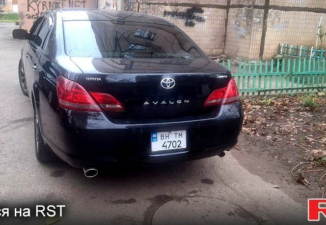 Черный Тойота Авалон, объемом двигателя 3.5 л и пробегом 220 тыс. км за 10500 $, фото 1 на Automoto.ua