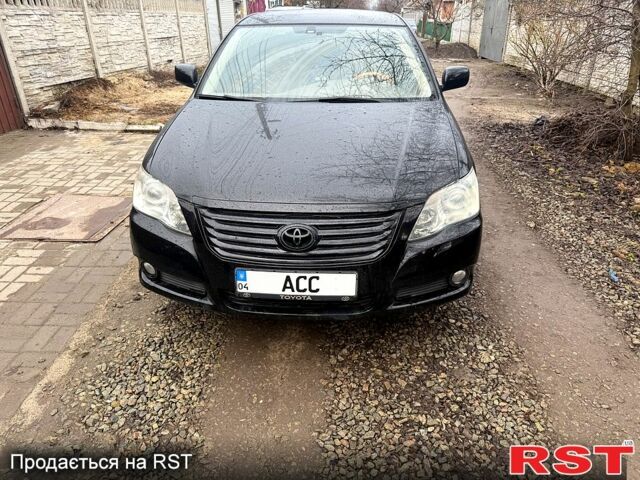 Черный Тойота Авалон, объемом двигателя 3.5 л и пробегом 300 тыс. км за 7500 $, фото 1 на Automoto.ua