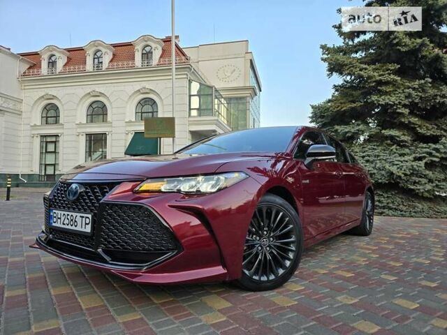Красный Тойота Авалон, объемом двигателя 2.49 л и пробегом 32 тыс. км за 30500 $, фото 1 на Automoto.ua