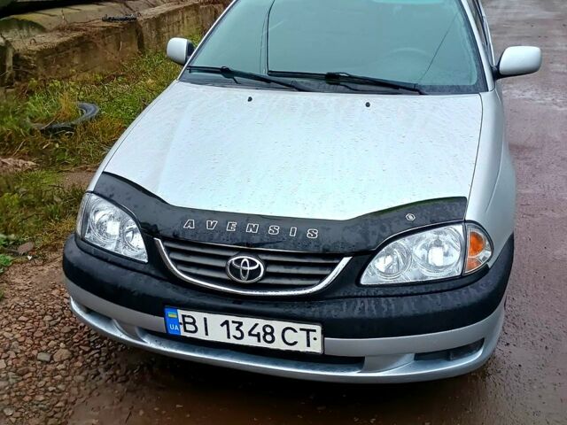 Белый Тойота Авенсис, объемом двигателя 2 л и пробегом 185 тыс. км за 4200 $, фото 1 на Automoto.ua