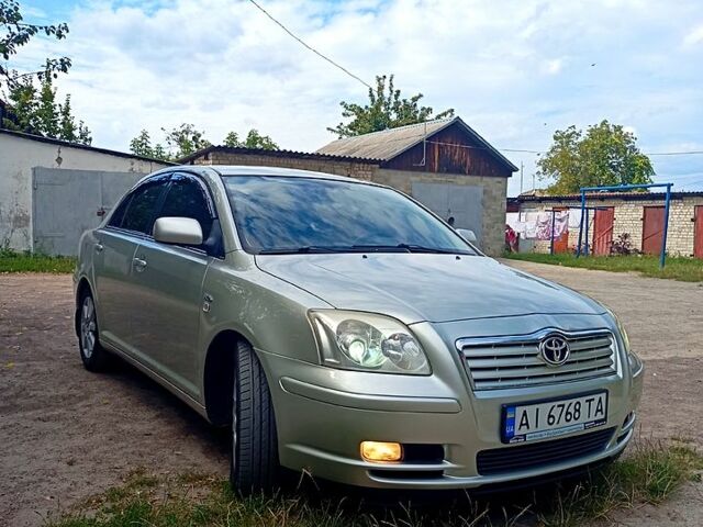 Бежевый Тойота Авенсис, объемом двигателя 2 л и пробегом 128 тыс. км за 5300 $, фото 1 на Automoto.ua