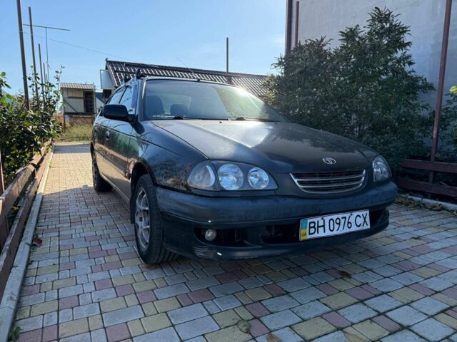 Черный Тойота Авенсис, объемом двигателя 1.8 л и пробегом 400 тыс. км за 2599 $, фото 1 на Automoto.ua