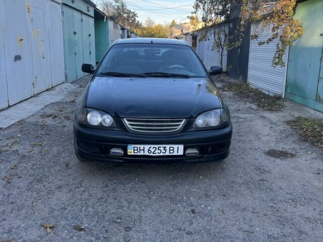 Чорний Тойота Авенсіс, об'ємом двигуна 1.6 л та пробігом 256 тис. км за 2450 $, фото 1 на Automoto.ua