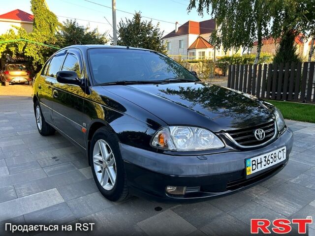 Черный Тойота Авенсис, объемом двигателя 2 л и пробегом 255 тыс. км за 3150 $, фото 1 на Automoto.ua