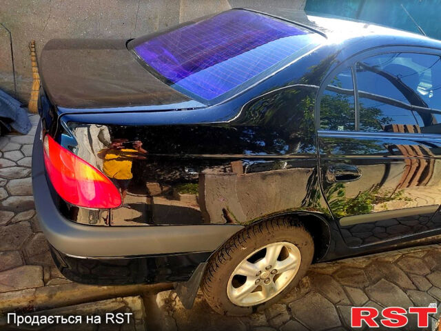 Черный Тойота Авенсис, объемом двигателя 2 л и пробегом 375 тыс. км за 3450 $, фото 1 на Automoto.ua