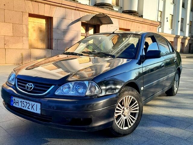 Черный Тойота Авенсис, объемом двигателя 1.8 л и пробегом 186 тыс. км за 1640 $, фото 1 на Automoto.ua