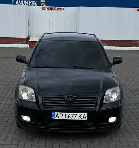 Черный Тойота Авенсис, объемом двигателя 2 л и пробегом 400 тыс. км за 5899 $, фото 1 на Automoto.ua