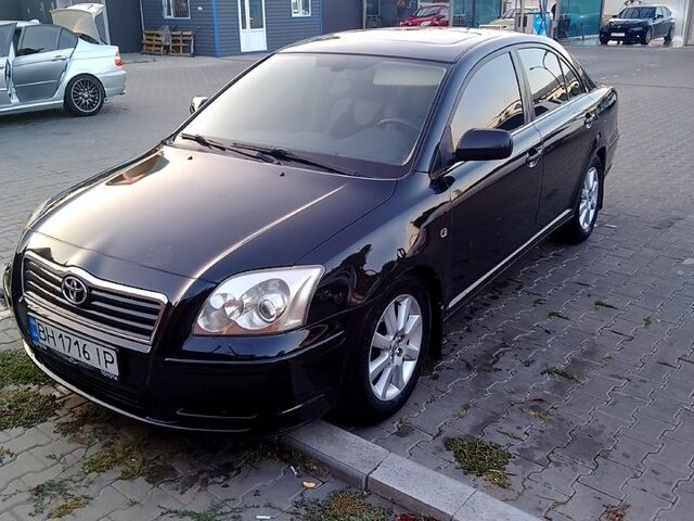 Черный Тойота Авенсис, объемом двигателя 2 л и пробегом 313 тыс. км за 4700 $, фото 1 на Automoto.ua