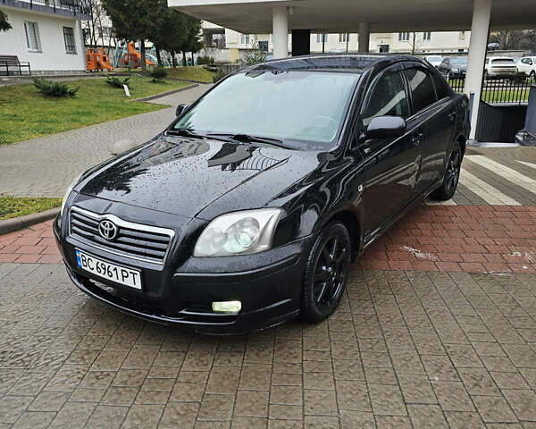 Чорний Тойота Авенсіс, об'ємом двигуна 2 л та пробігом 264 тис. км за 4400 $, фото 1 на Automoto.ua