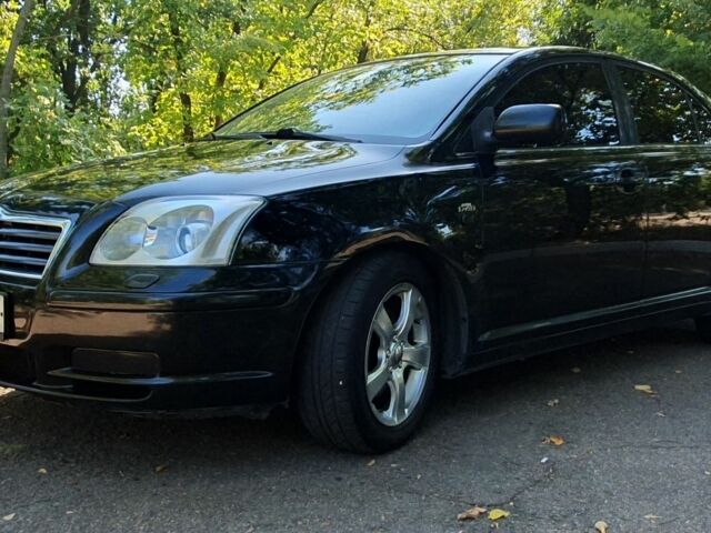 Черный Тойота Авенсис, объемом двигателя 2 л и пробегом 221 тыс. км за 5600 $, фото 1 на Automoto.ua