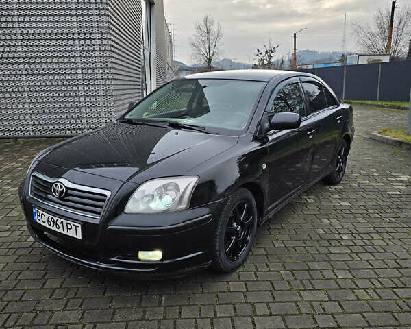 Чорний Тойота Авенсіс, об'ємом двигуна 2 л та пробігом 264 тис. км за 4450 $, фото 1 на Automoto.ua