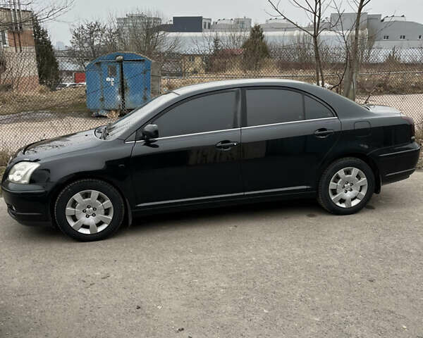Черный Тойота Авенсис, объемом двигателя 1.8 л и пробегом 213 тыс. км за 7200 $, фото 1 на Automoto.ua