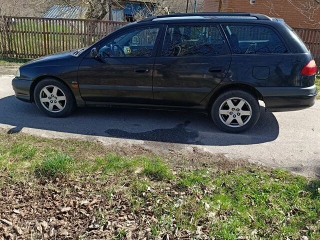 Чорний Тойота Авенсіс, об'ємом двигуна 1.8 л та пробігом 204 тис. км за 4300 $, фото 1 на Automoto.ua