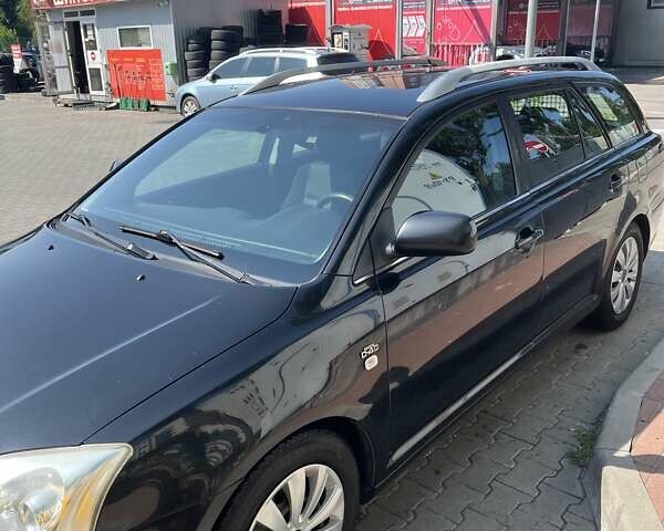 Черный Тойота Авенсис, объемом двигателя 2 л и пробегом 403 тыс. км за 4350 $, фото 1 на Automoto.ua