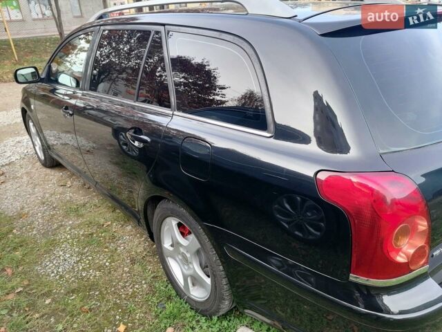 Черный Тойота Авенсис, объемом двигателя 2 л и пробегом 247 тыс. км за 5000 $, фото 1 на Automoto.ua