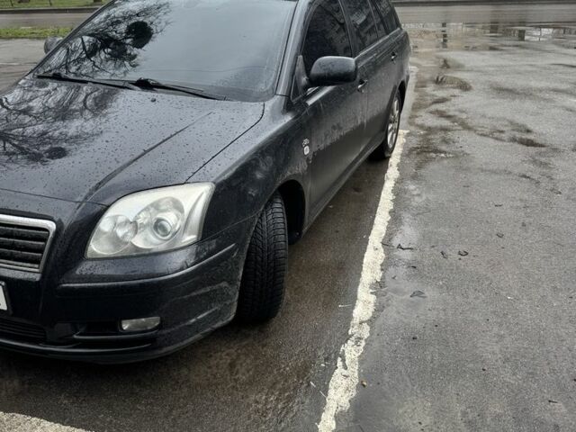 Черный Тойота Авенсис, объемом двигателя 2 л и пробегом 395 тыс. км за 3300 $, фото 1 на Automoto.ua