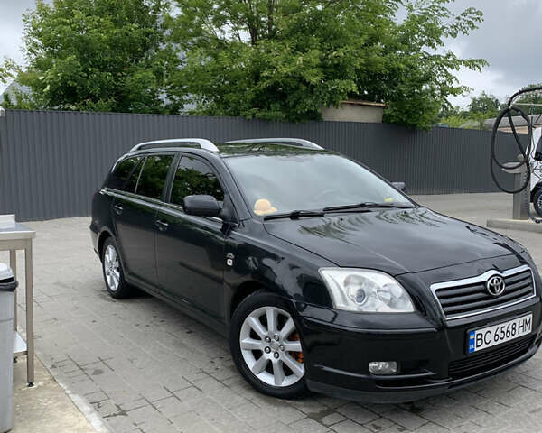 Черный Тойота Авенсис, объемом двигателя 2 л и пробегом 390 тыс. км за 5250 $, фото 1 на Automoto.ua