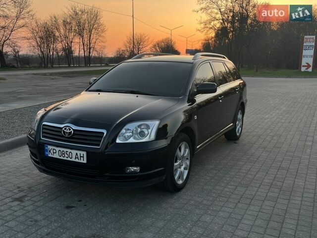 Черный Тойота Авенсис, объемом двигателя 2.4 л и пробегом 290 тыс. км за 6700 $, фото 1 на Automoto.ua