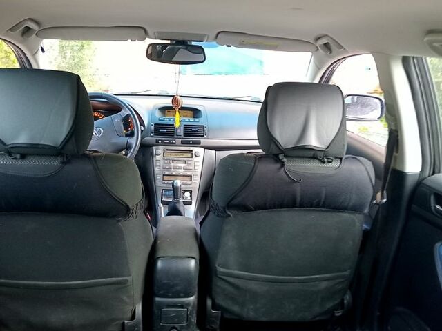 Черный Тойота Авенсис, объемом двигателя 2 л и пробегом 245 тыс. км за 5000 $, фото 1 на Automoto.ua