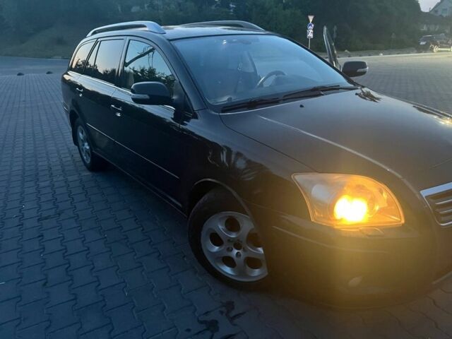 Черный Тойота Авенсис, объемом двигателя 2 л и пробегом 306 тыс. км за 7500 $, фото 1 на Automoto.ua