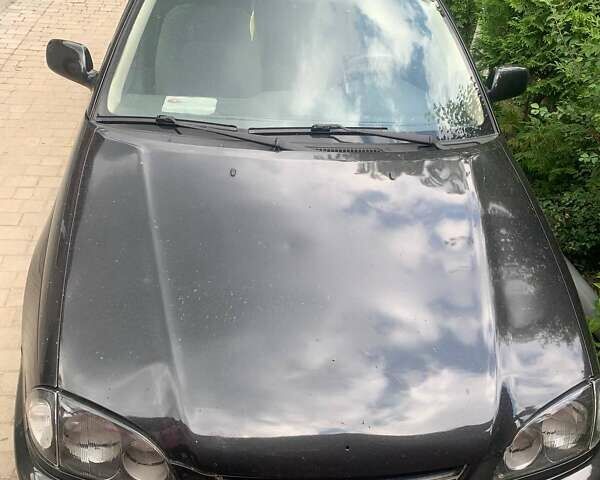 Черный Тойота Авенсис, объемом двигателя 1.76 л и пробегом 417 тыс. км за 2800 $, фото 1 на Automoto.ua