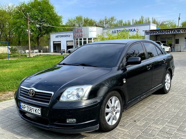 Черный Тойота Авенсис, объемом двигателя 2 л и пробегом 350 тыс. км за 3950 $, фото 1 на Automoto.ua