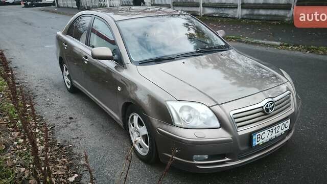 Коричневый Тойота Авенсис, объемом двигателя 2 л и пробегом 370 тыс. км за 4500 $, фото 1 на Automoto.ua