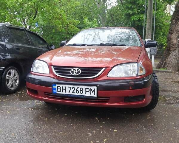 Красный Тойота Авенсис, объемом двигателя 1.8 л и пробегом 402 тыс. км за 3600 $, фото 1 на Automoto.ua
