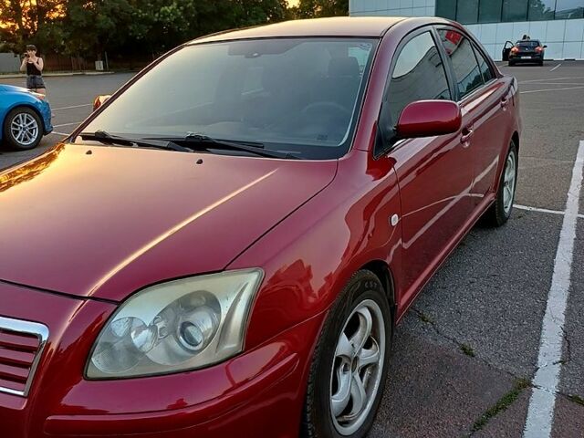 Красный Тойота Авенсис, объемом двигателя 2 л и пробегом 264 тыс. км за 4800 $, фото 1 на Automoto.ua