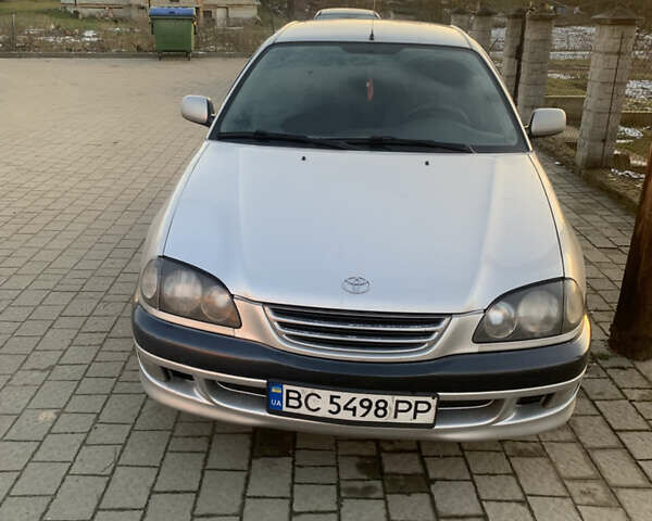 Серый Тойота Авенсис, объемом двигателя 1.6 л и пробегом 412 тыс. км за 2700 $, фото 1 на Automoto.ua