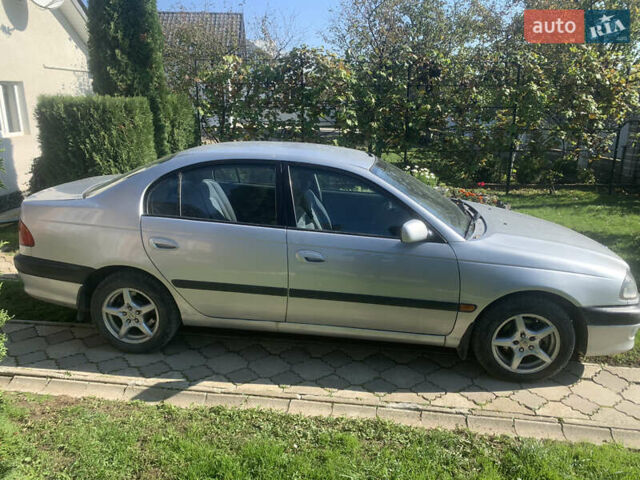 Серый Тойота Авенсис, объемом двигателя 1.8 л и пробегом 270 тыс. км за 3000 $, фото 1 на Automoto.ua