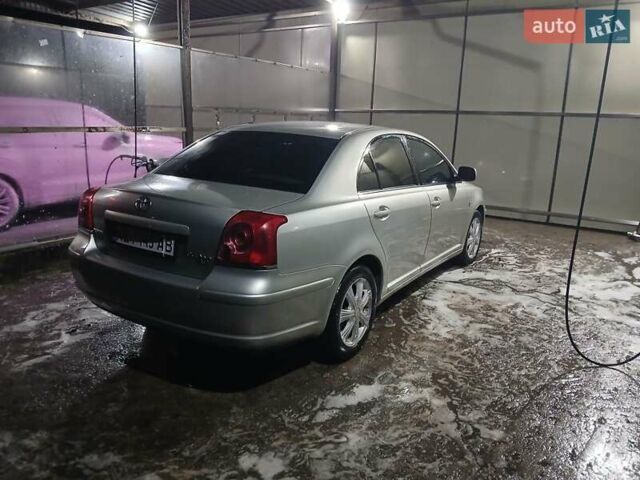 Серый Тойота Авенсис, объемом двигателя 2 л и пробегом 246 тыс. км за 5300 $, фото 1 на Automoto.ua