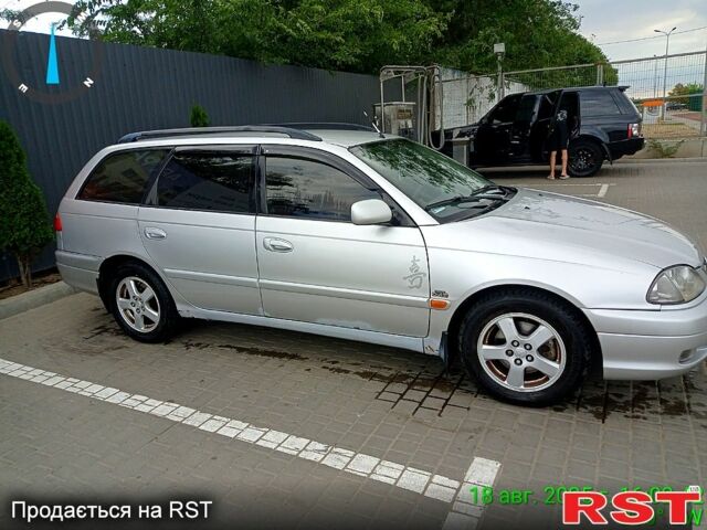 Серый Тойота Авенсис, объемом двигателя 2 л и пробегом 303 тыс. км за 2500 $, фото 1 на Automoto.ua