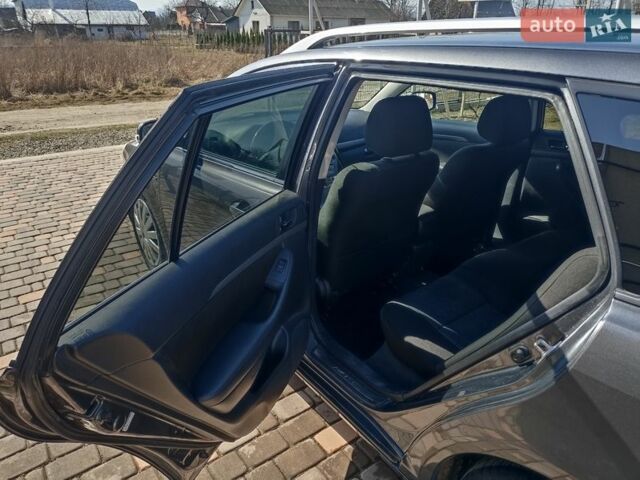 Серый Тойота Авенсис, объемом двигателя 2.2 л и пробегом 236 тыс. км за 6500 $, фото 1 на Automoto.ua