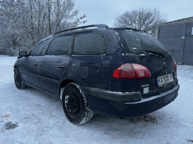 Синий Тойота Авенсис, объемом двигателя 1.8 л и пробегом 303 тыс. км за 1500 $, фото 1 на Automoto.ua